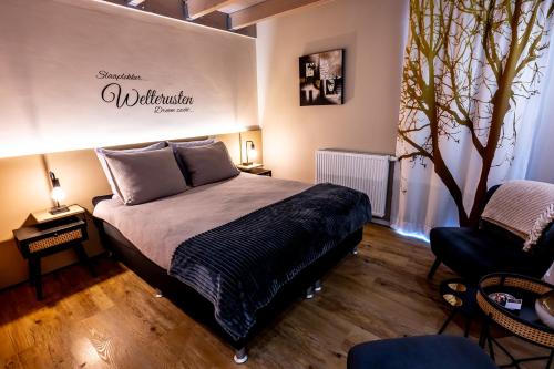 Katil atau katil-katil dalam bilik di B&B Mooi Montferland
