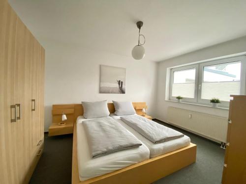 Katil atau katil-katil dalam bilik di Ferienwohnung Waldi