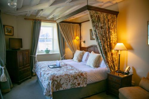 Ένα ή περισσότερα κρεβάτια σε δωμάτιο στο Star Castle Hotel