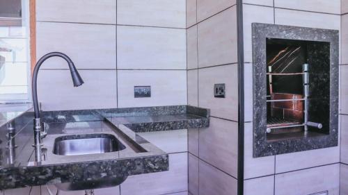 Dapur atau dapur kecil di Casa Amaral Pet-Friendly com piscina p 10 pessoas