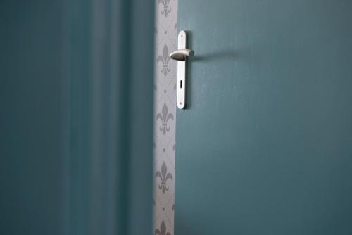 a close up of a door with a handle at Sublime Villa & Caves in Akrotiri