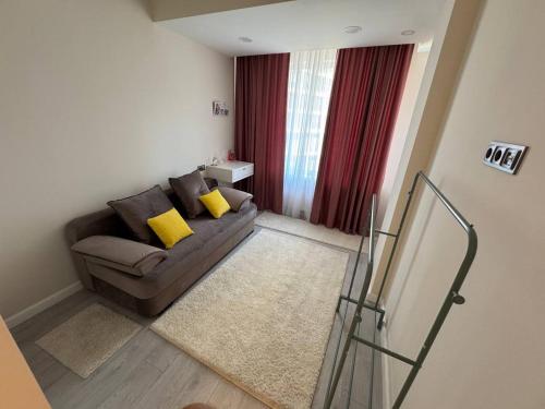 Ένα ή περισσότερα κρεβάτια σε δωμάτιο στο Tiana Apartments