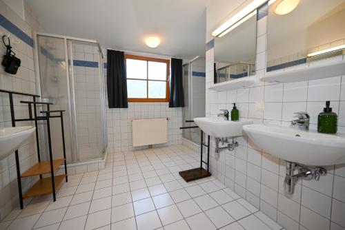 Ένα μπάνιο στο Schmitten 27 Rooms & Apartments by All in One Apartments