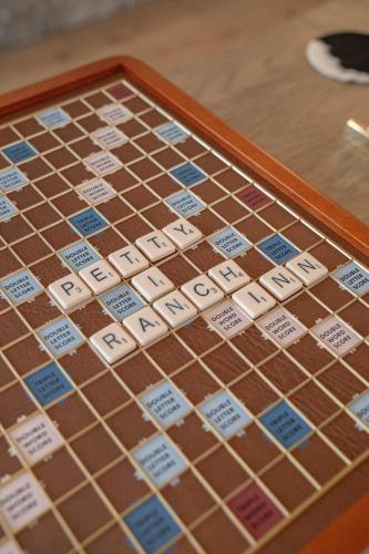 a close up of a board game on a table at Petty Ranch Inn in Springdale