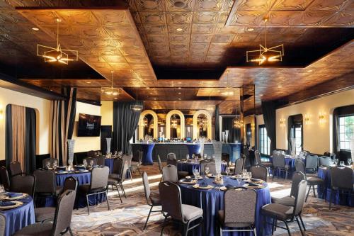 a banquet hall with blue tables and chairs at Residence Inn by Marriott Reno South in Reno
