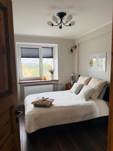 Кровать или кровати в номере Christian apartment stay in Haapsalu