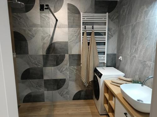 Ένα μπάνιο στο MODERNOVA Apartament Walendów Park