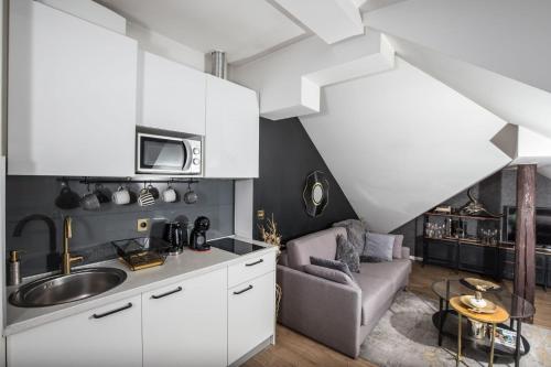 Küche/Küchenzeile in der Unterkunft Note Luxury Apartments