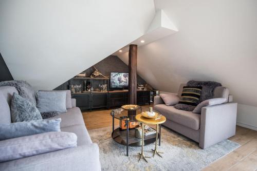 Ein Sitzbereich in der Unterkunft Note Luxury Apartments