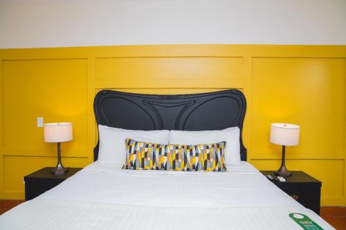 Postel nebo postele na pokoji v ubytování Hotel Los Portales