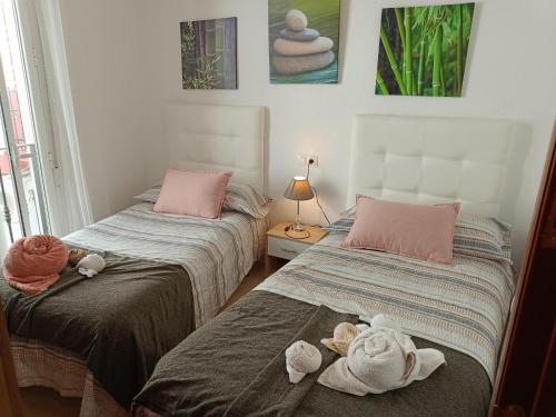 Postel nebo postele na pokoji v ubytování CASA ALFONSO