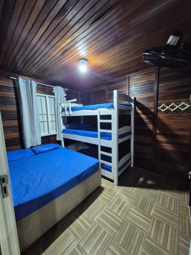 Postel nebo postele na pokoji v ubytování Casa Chalé Ilha Comprida