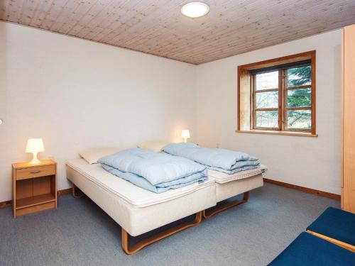Ένα ή περισσότερα κρεβάτια σε δωμάτιο στο 12 person holiday home in Nordborg-By Traum