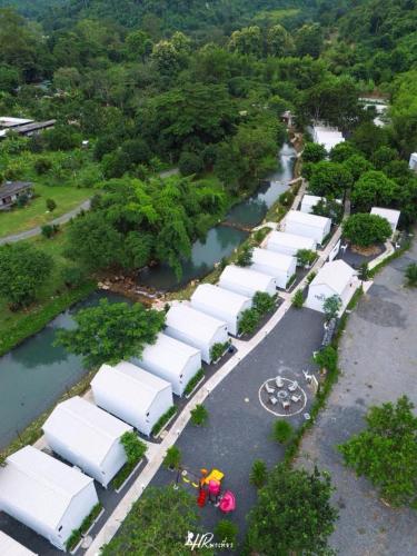 an aerial view of a bunch of white tanks at ชิลล์ แคมป์ ชะอม in Ban Bung Mai
