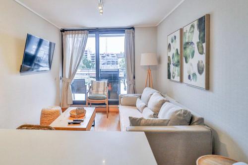 TV a/nebo společenská místnost v ubytování HOM I Depto con Gran Terraza con Vista al Lago