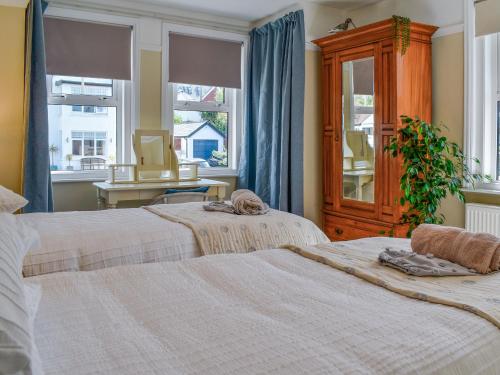 Ένα ή περισσότερα κρεβάτια σε δωμάτιο στο Miramar