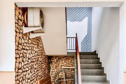 Fotografie z fotogalerie ubytování Quantum Guesthouse Tasikmalaya Mitra RedDoorz v destinaci Tasikmalaya