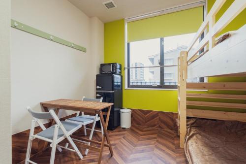 Φωτογραφία από το άλμπουμ του HOTEL 萃 the 3rd-雑餉隈駅前-無人ホテル-HOTEL SUI the third-ZASSHO-Unmanned Hotel στη Φουκουόκα