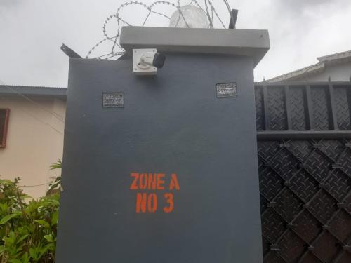 a gray box with the words zone a no on it at Budget one bedroom apartment in Ibadan