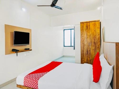 Ένα ή περισσότερα κρεβάτια σε δωμάτιο στο Hotel O Ace Executive