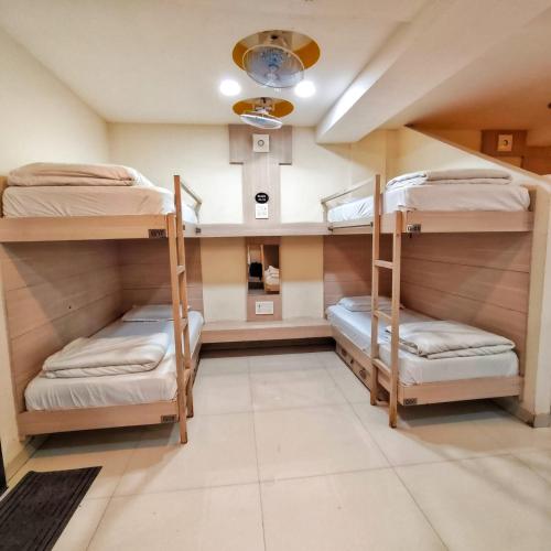 Postel nebo postele na pokoji v ubytování Hotel Amigo