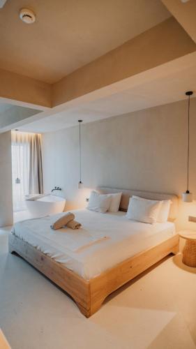 a bedroom with a large bed in a room at La Gaia - Adult Only in Alanya