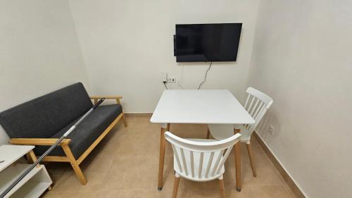 Televisyen dan/atau pusat hiburan di Apartamento para 2 personas en Jaén