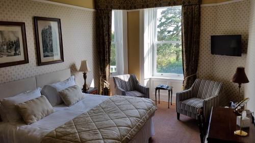 Ένα ή περισσότερα κρεβάτια σε δωμάτιο στο Pencubitt House