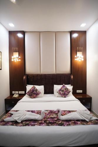 Postel nebo postele na pokoji v ubytování Hotel Royal Imperio