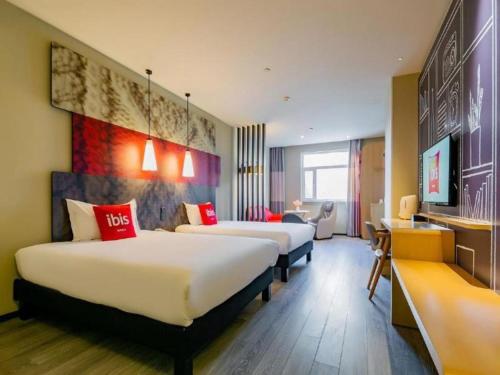 Ένα ή περισσότερα κρεβάτια σε δωμάτιο στο ibis Xi'an First Gaoxin RD