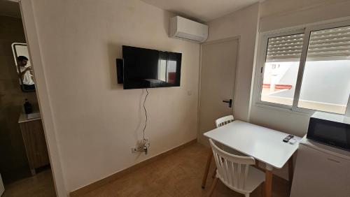 Μια τηλεόραση ή/και κέντρο ψυχαγωγίας στο Estudio para pareja en Jaen