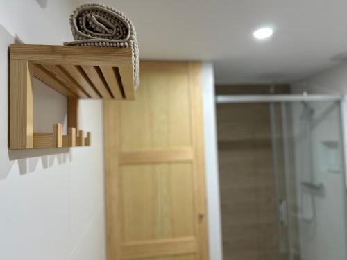 a bathroom with a shower and a glass door at Can Sablet in Horta de San Joan