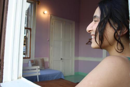 Ένα ή περισσότερα κρεβάτια σε δωμάτιο στο Lotus Garden Hostel Izmir