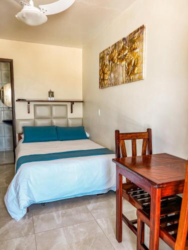 Postel nebo postele na pokoji v ubytování Hotel Garni Cruzeiro do Sul