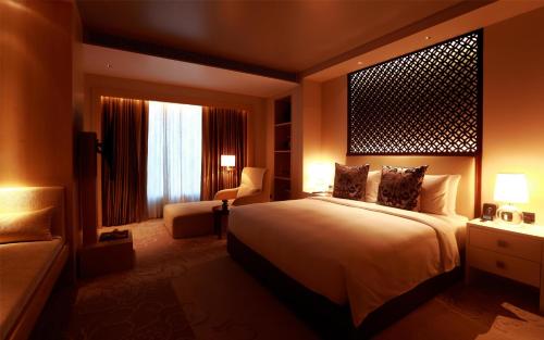 Un ou plusieurs lits dans un hébergement de l'établissement Park Hyatt Chennai