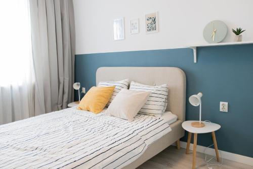 Ένα ή περισσότερα κρεβάτια σε δωμάτιο στο Central Varna Vibes