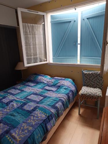 Llit o llits en una habitació de maison latéral mer