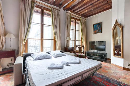 Duplex de charme parisien au coeur du Marais