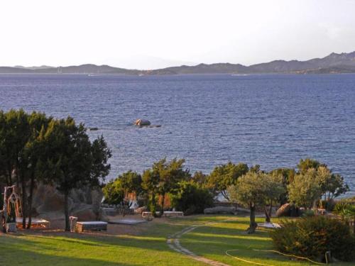 a view of a large body of water at elegant apartment near the beach of Baja Sardinia in Baraccamenti