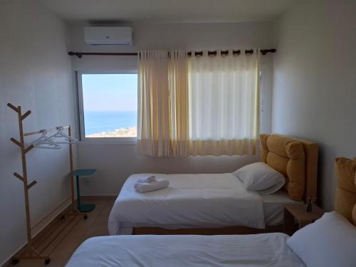 Ένα ή περισσότερα κρεβάτια σε δωμάτιο στο Bright appartment