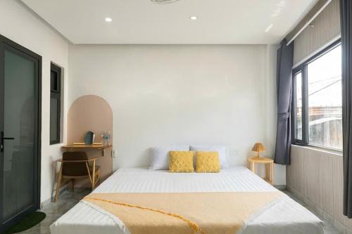 Ένα ή περισσότερα κρεβάτια σε δωμάτιο στο Lune House Da Lat