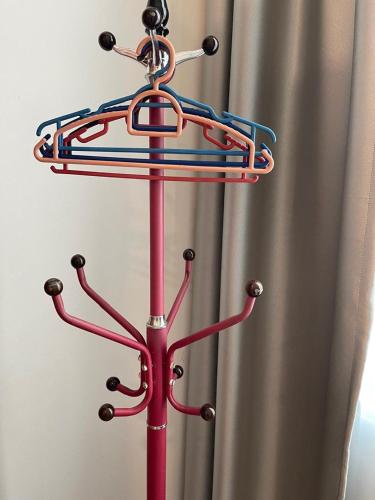 a towel rack on top of a baseball at Dream Home Landed Balik Pulau in Balik Pulau