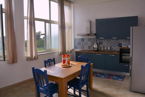 Кухня или мини-кухня в Bellavista sul Mare
