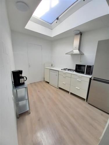 Kuchyň nebo kuchyňský kout v ubytování Comme chez soi