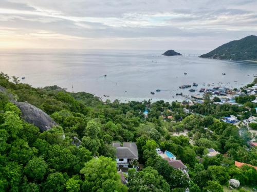 a view of a bay with boats in the water at Villa Mar Koh Tao in Koh Tao