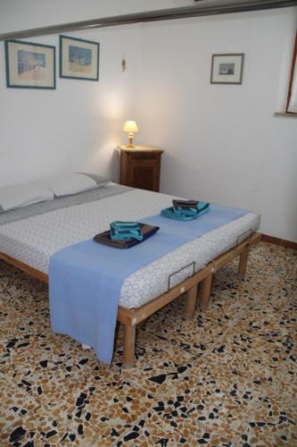 Postel nebo postele na pokoji v ubytování Bouganville house