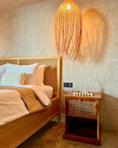 Кровать или кровати в номере The Salt Boutique Hotel by Wyns