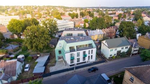 an aerial view of a city with a white building at Sodų Vilos in Kaunas