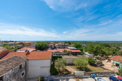 a view from the roof of a town at Penthouse Stella Marini with jacuzzi and sea view 2,5 km from sea in Tar
