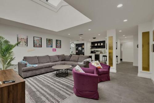 a living room with a couch and two chairs at Whitewater River House - Game Room, Firepit, Walking distance to Whitewater Amphitheater! in Sattler
